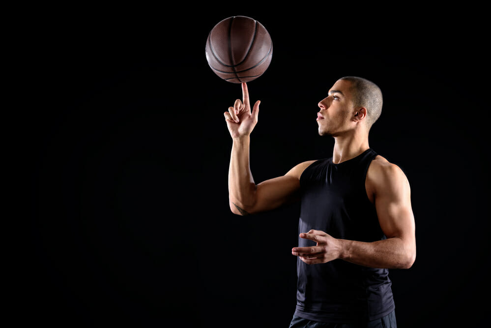 how to spin a  basketball on your finger